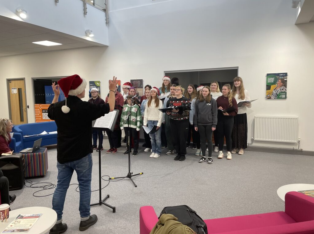 Musical Theatre students performing carols at the event